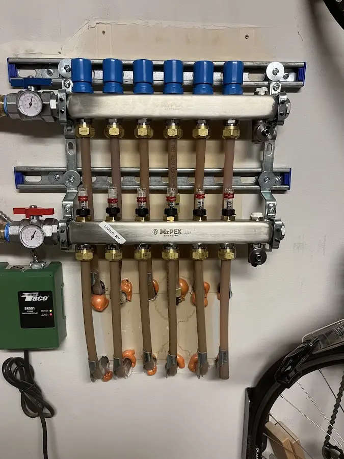 Plumber performing Water Heater Repair at a residential property in Summerville